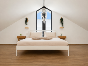 Bed beneath the sloping roof, with wooden flooring and a tall triangular window.