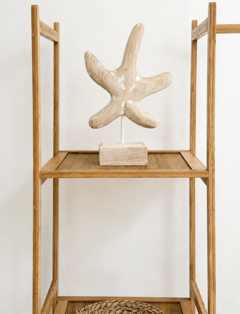 Decorative starfish on the wooden clothes rack shelf.